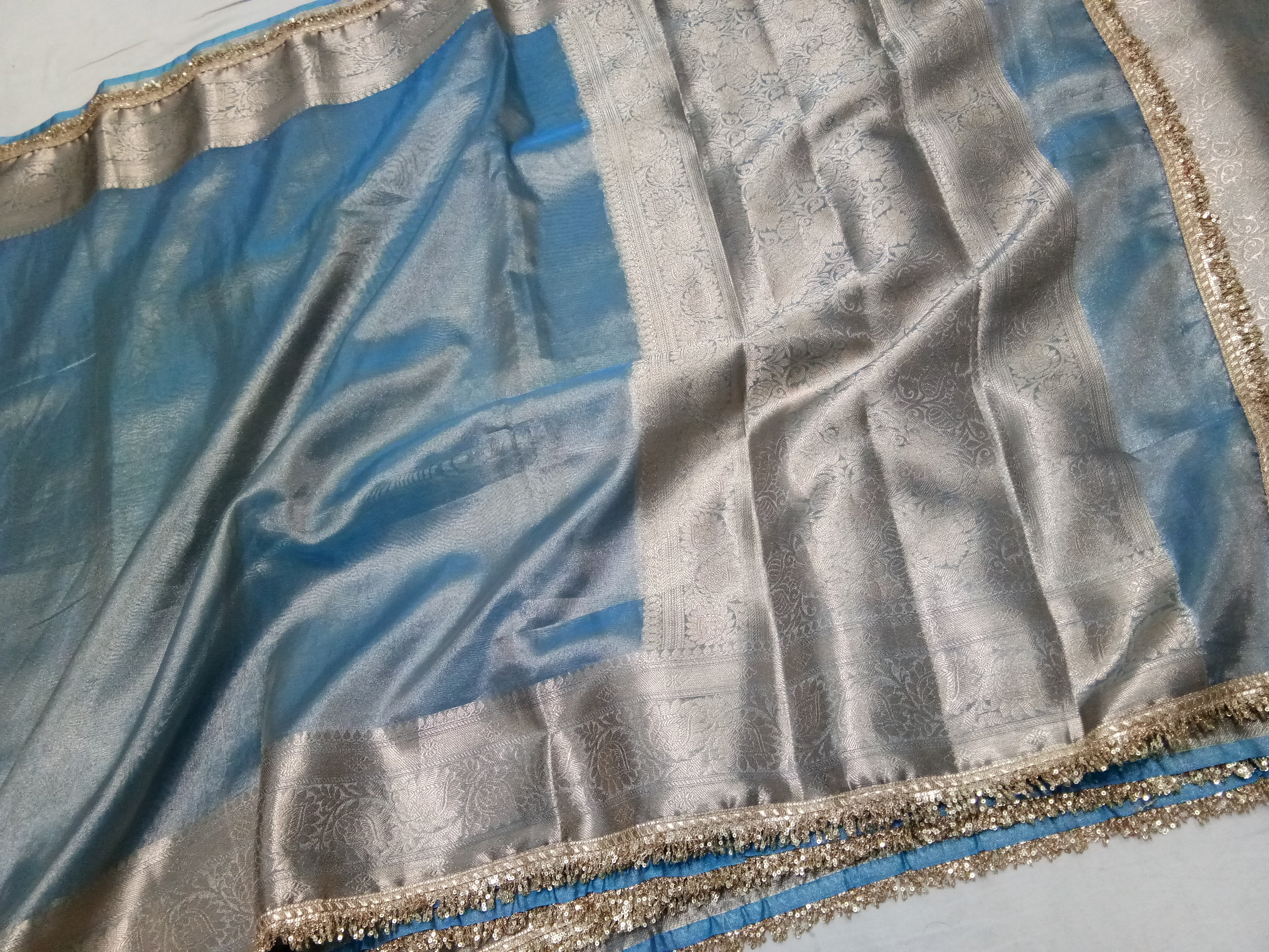Blue Colour Tissue Plain Body Saree With Gota Patti Work