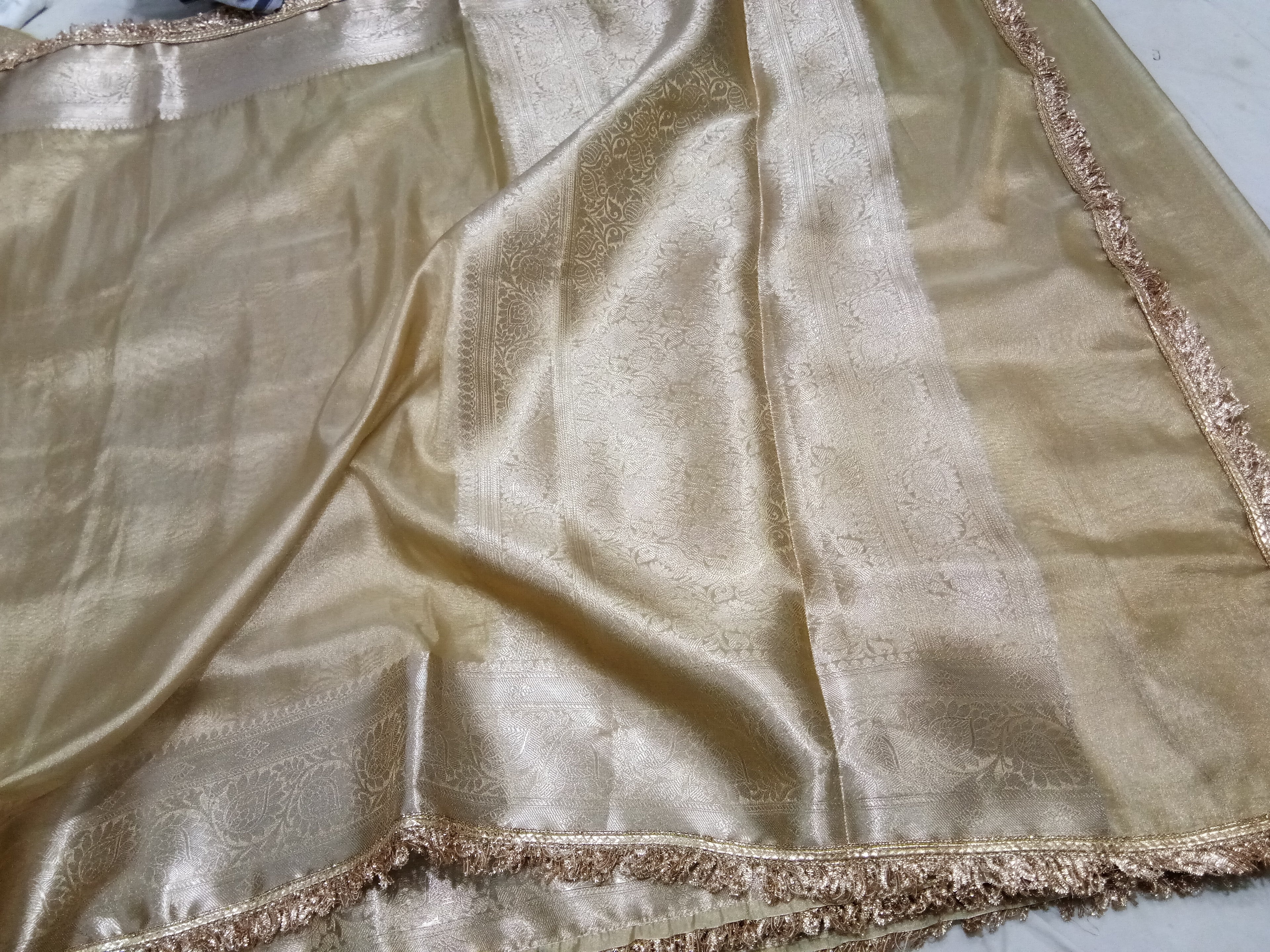 Beige Colour Tissue Plain Body Saree With Gota Patti Work