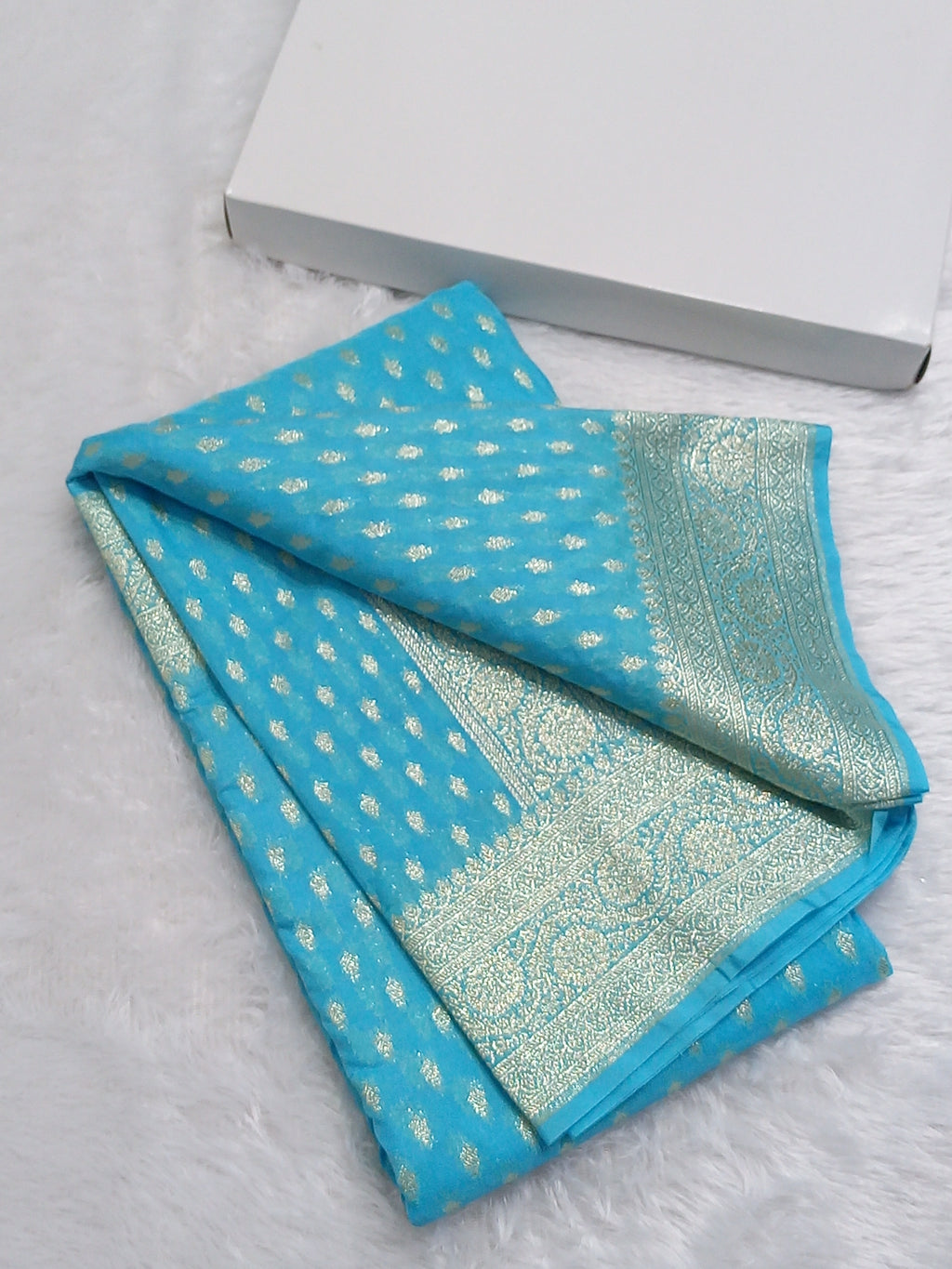Sky Blue Colour Zari Buti Georgette Saree