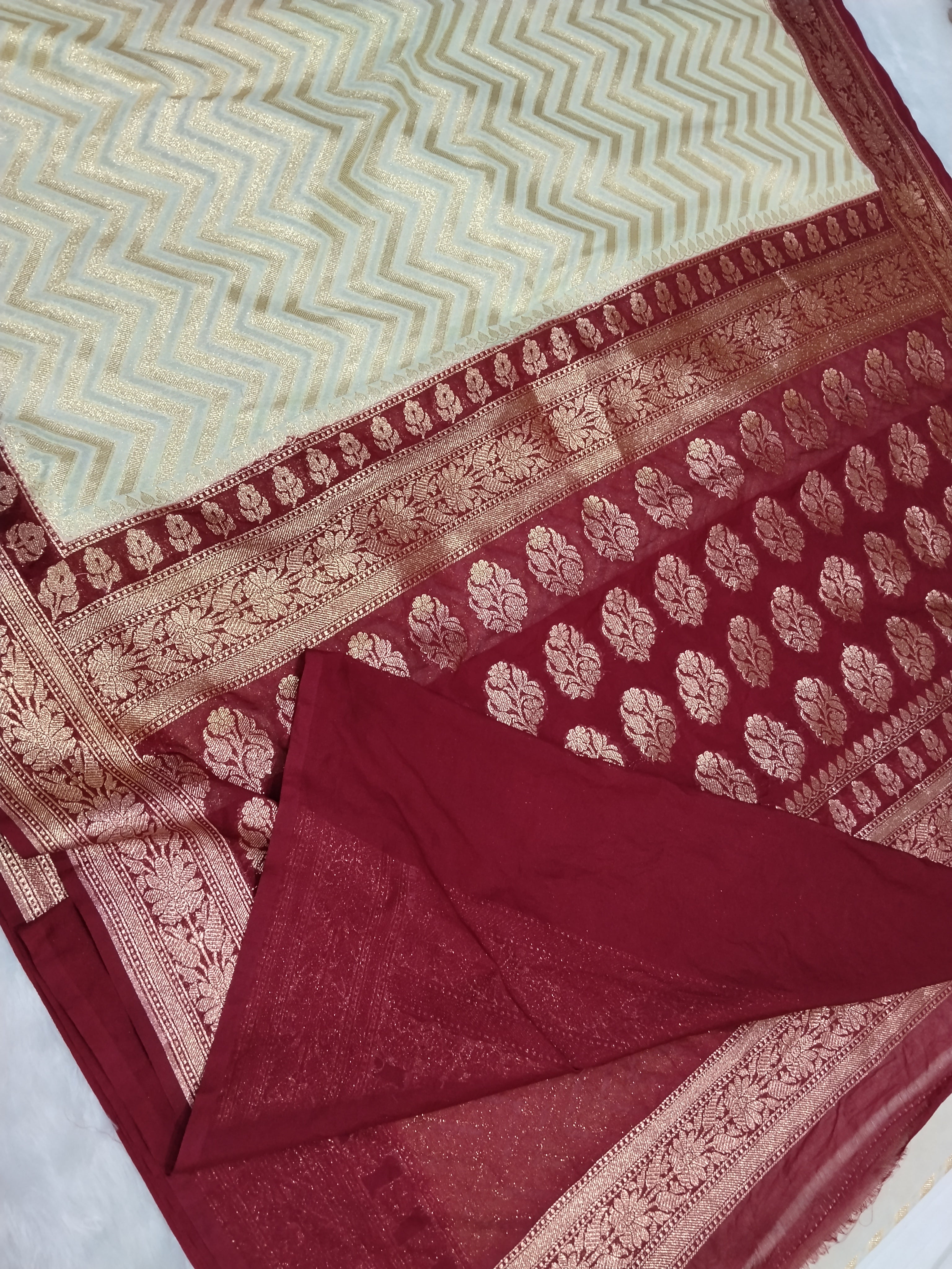 Cream And Maroon Colour Banarasi Khaddi Georgette Saree Golden Zari