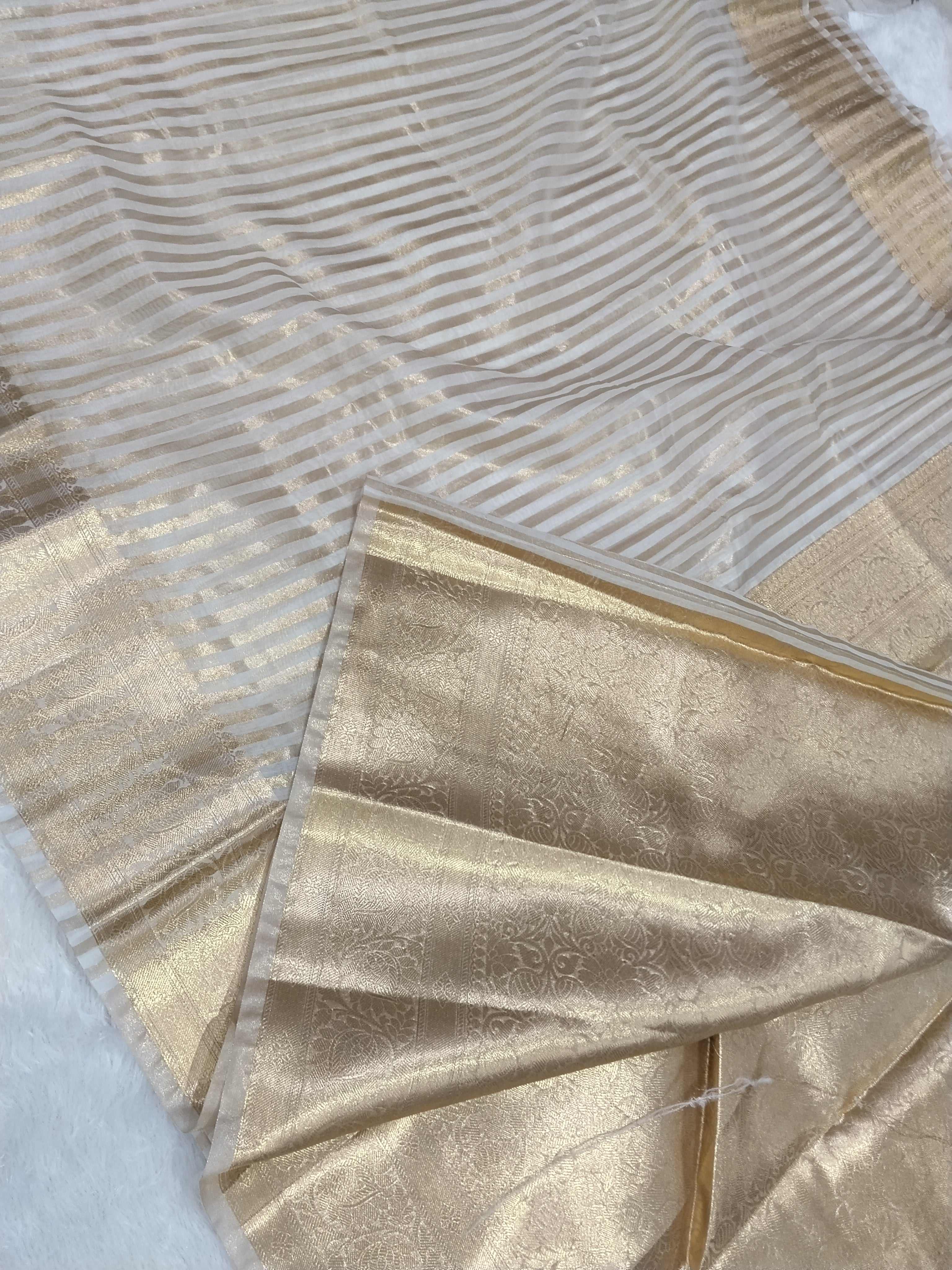 Off White Banarasi Fancy Cotton Saree With Strip Zari And Brocade Blouse