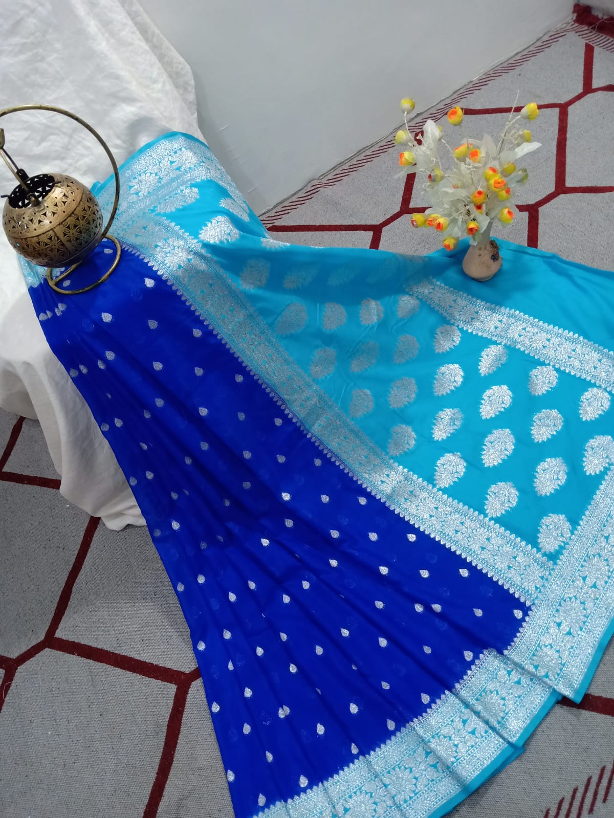 Navy Blue And Sky Blue Colour Zari Buti Khaddi Georgette Saree