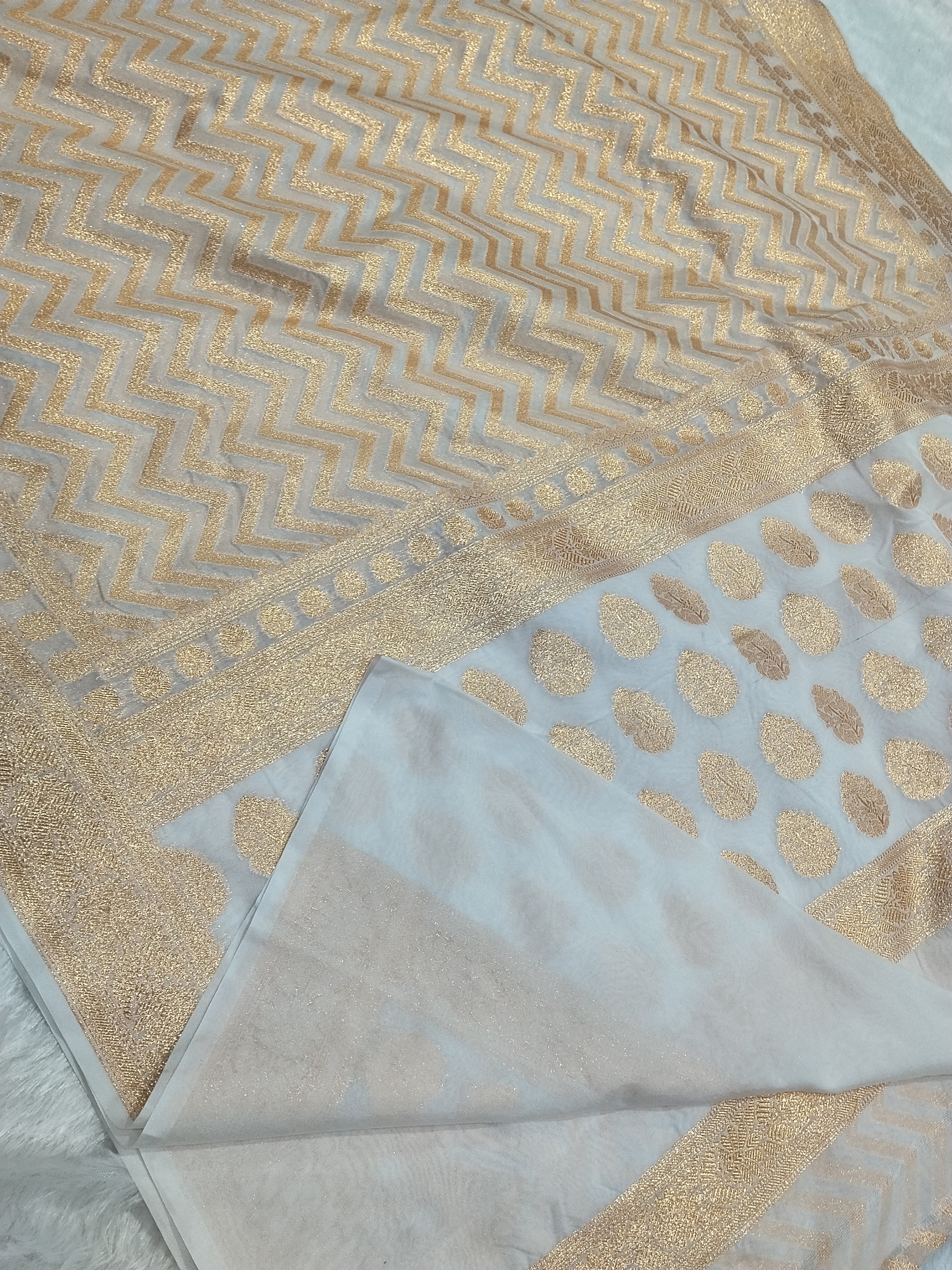 Cream Colour Golden Zari Khaddi Georgette Saree