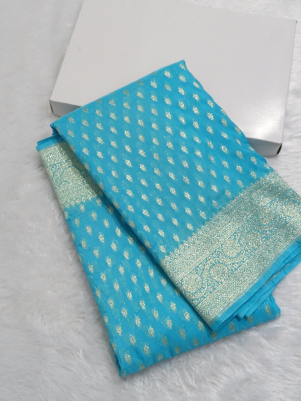 Sky Blue Colour Zari Buti Georgette Saree