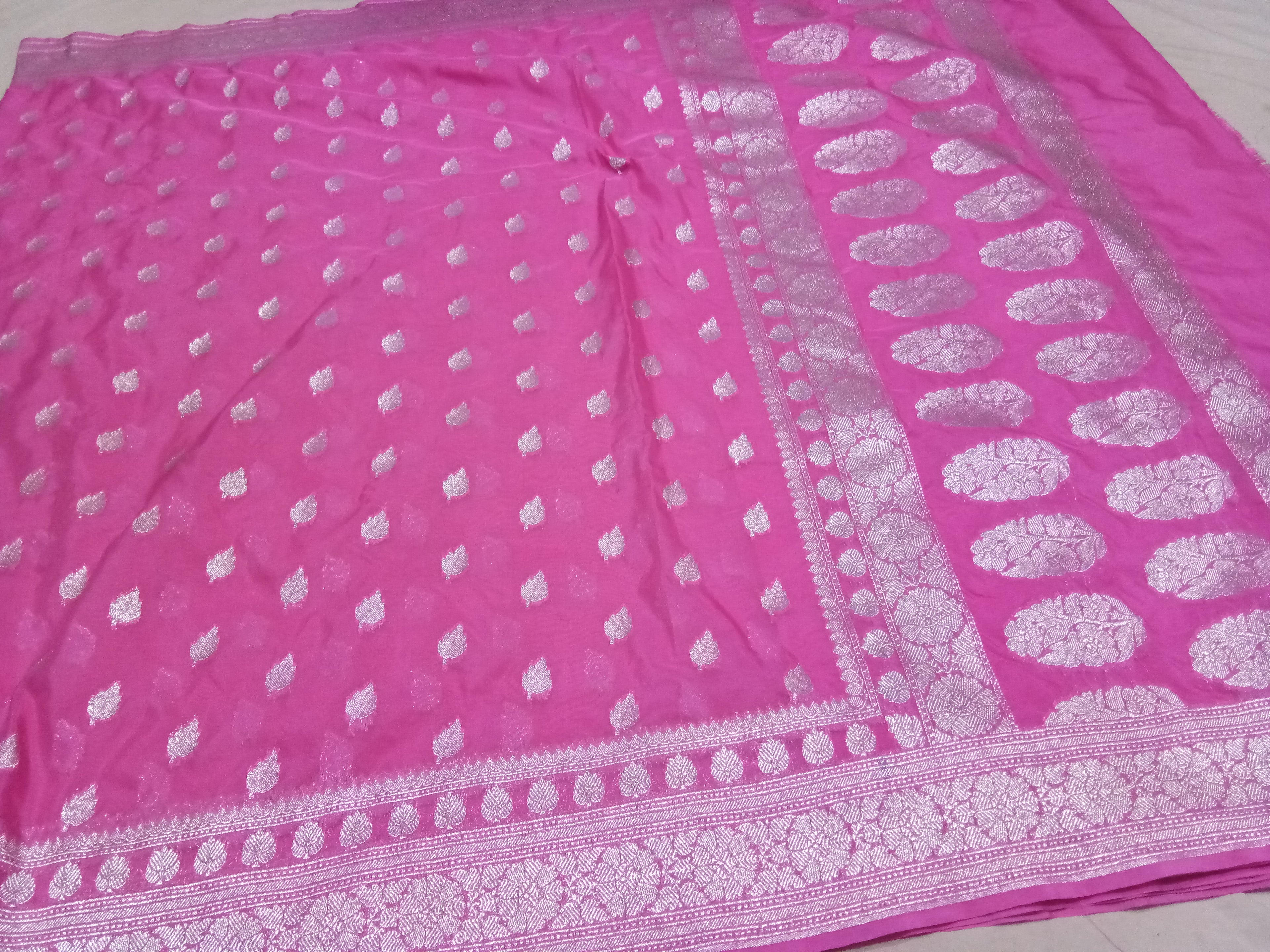 Viral Pink Colour Zari Buti Khaddi Georgette Saree