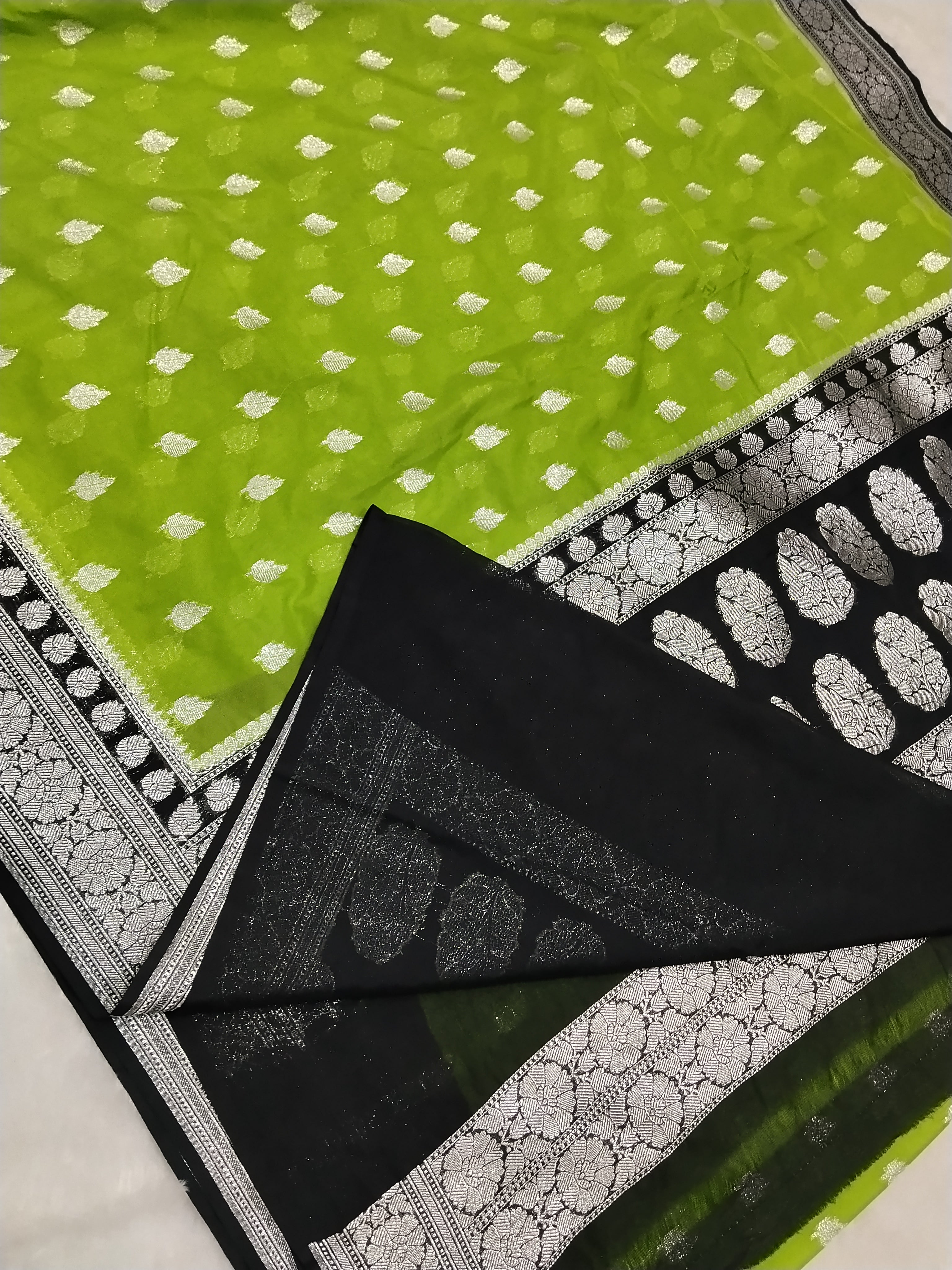 Parrot Green And Black Colour Banarasi Khaddi Georgette Saree