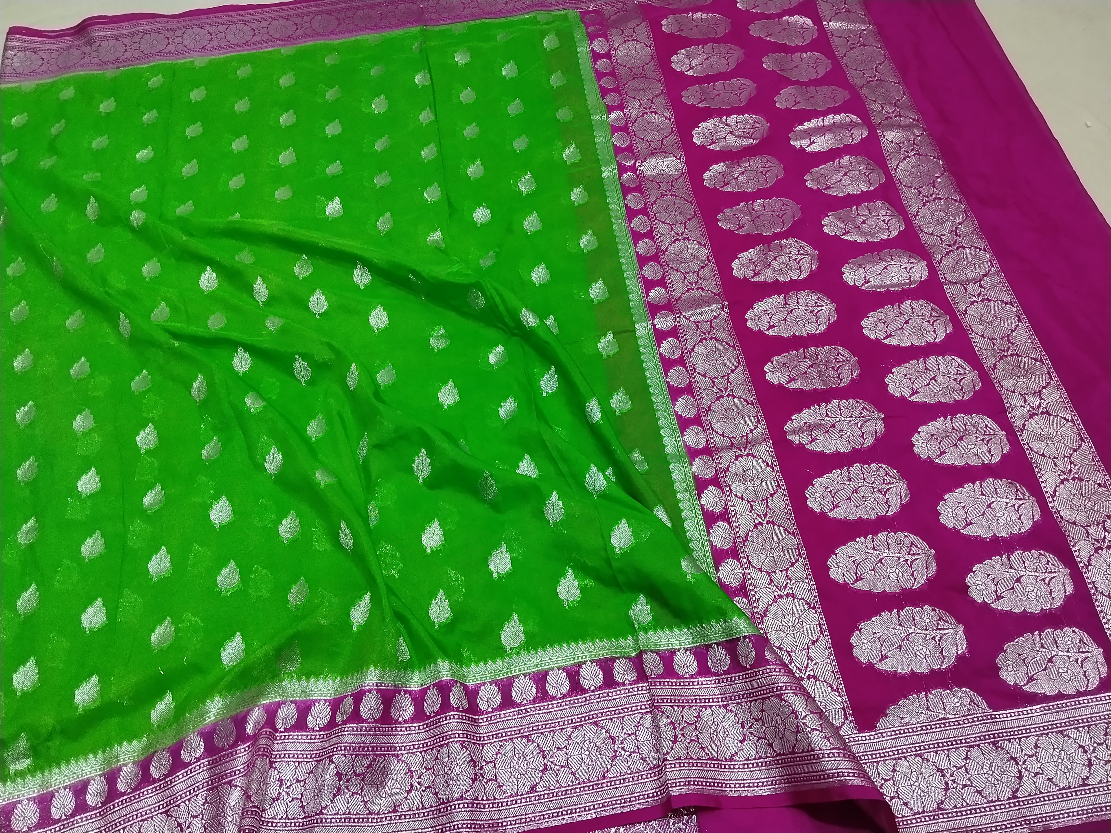 Parrot Green And Pink Colour Zari Buti Khaddi Georgette Saree