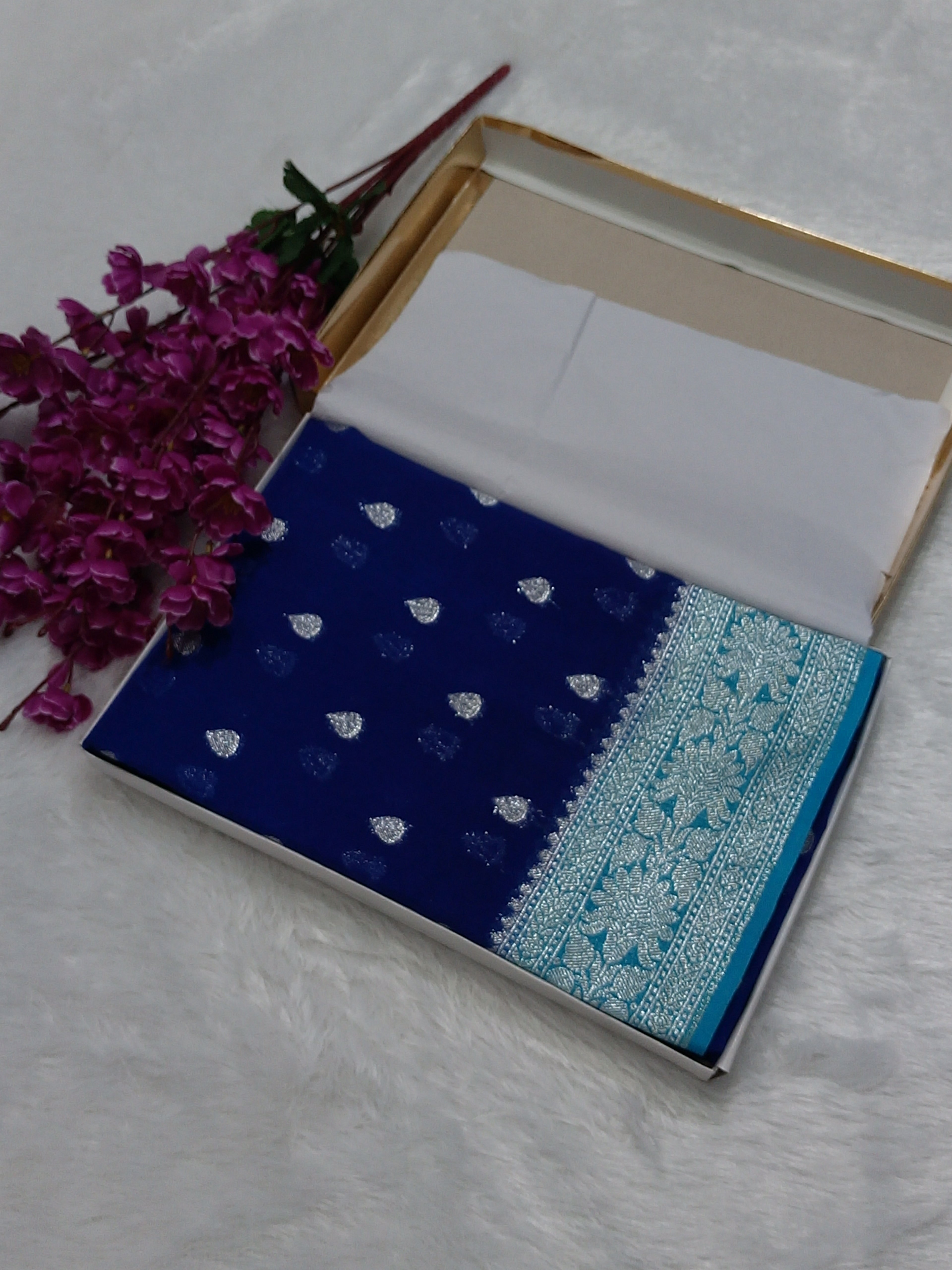 Navy Blue And Sky Blue Colour Zari Buti Khaddi Georgette Saree