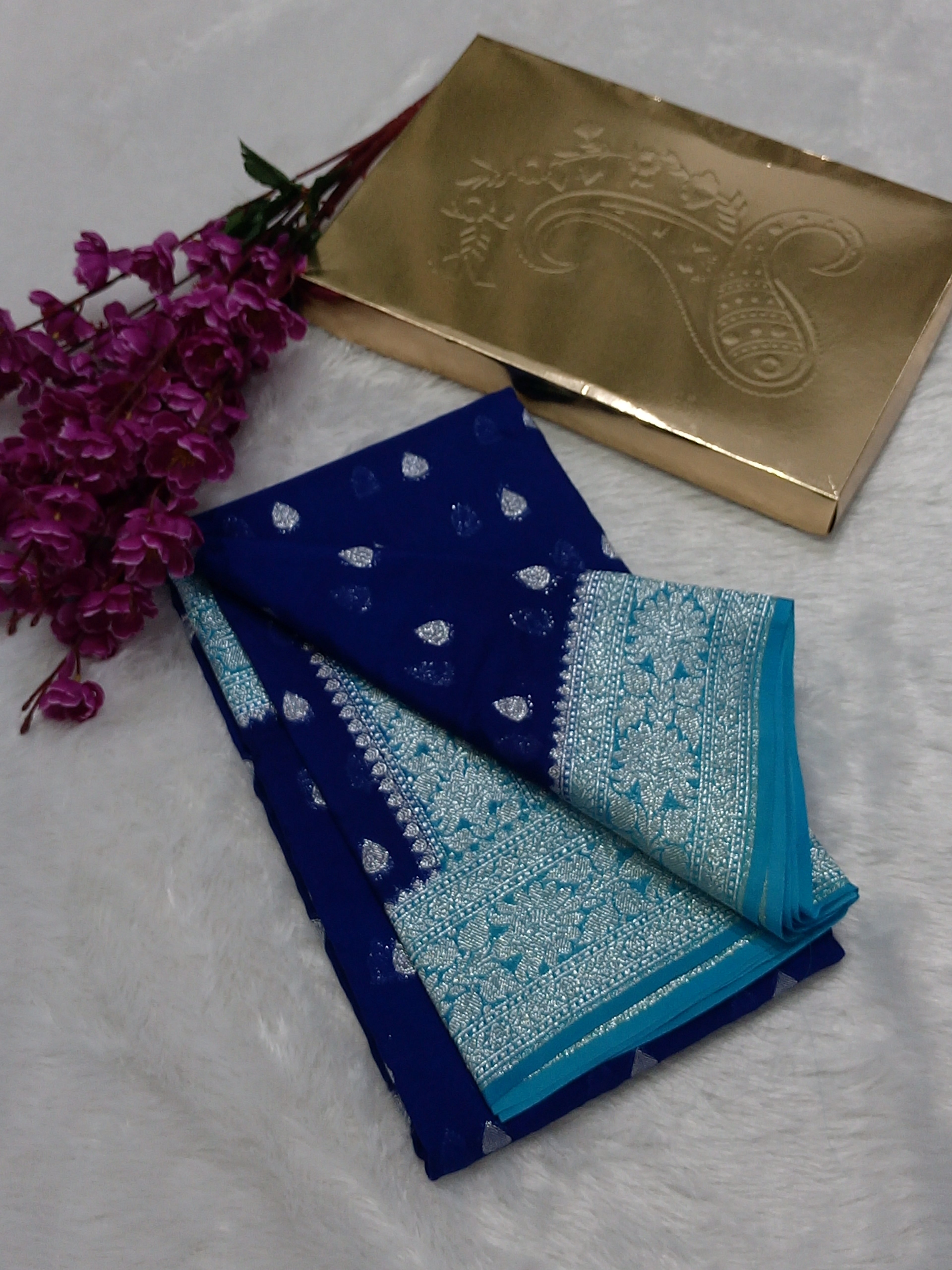Navy Blue And Sky Blue Colour Zari Buti Khaddi Georgette Saree