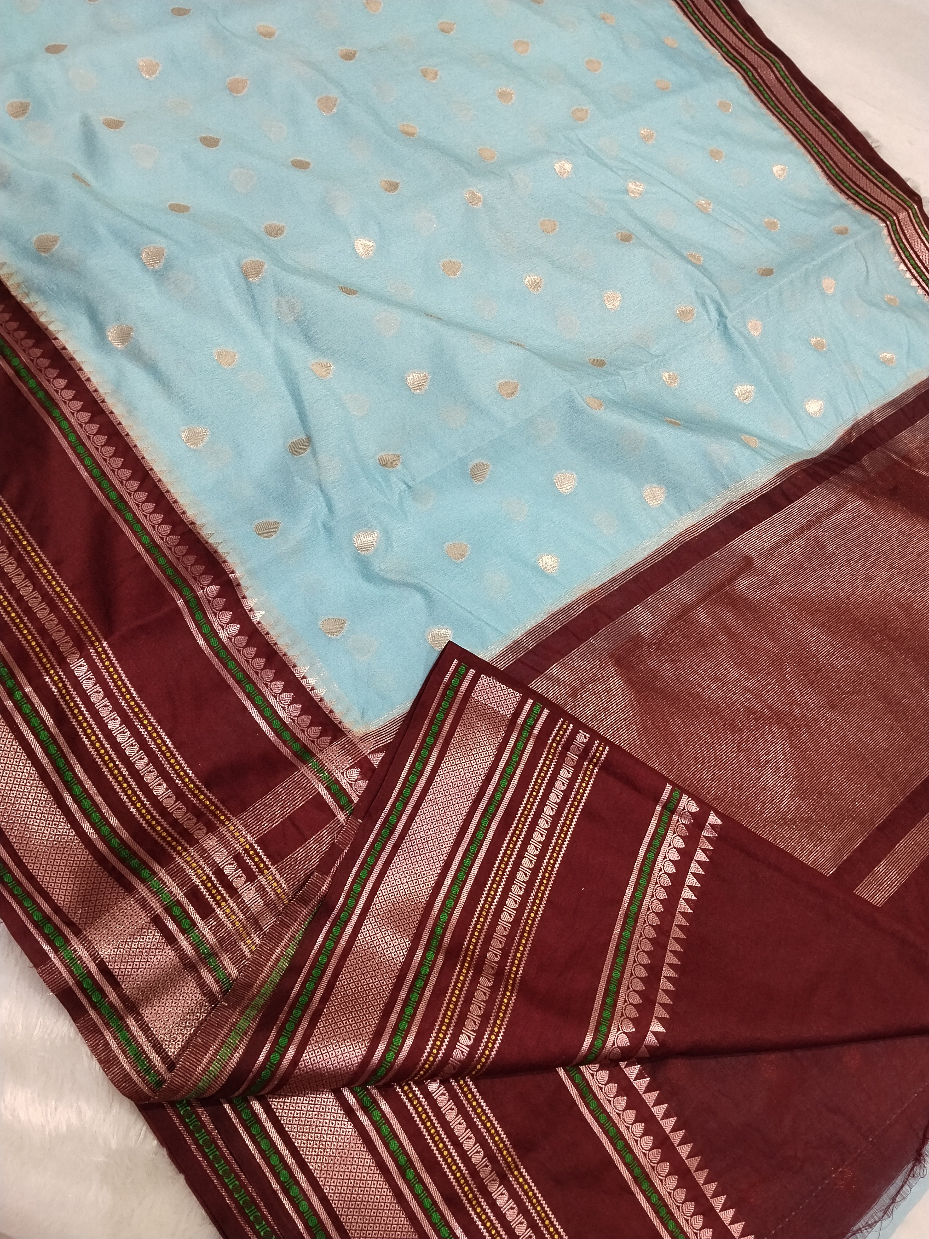 Sky Blue And Maroon Colour Kanjivaram Border Moonga Silk Saree With Buti